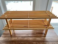 Full view of shoe rack front and side profile