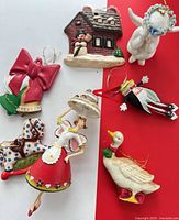 Group shot of all seven ceramic ornaments