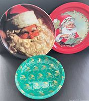 Three Santa-themed trays front view