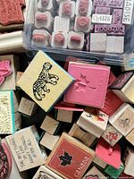 Assorted wood-mounted stamps and calendar set spread out