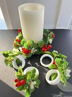 LED candle with wreath and four napkin rings displayed