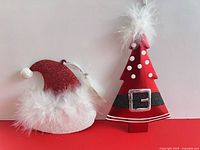 Front view of both ornaments showing design and condition