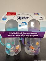 Retail packaging front showing two Playtex Sipsters weighted straw cups