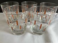 Five glasses grouped to show pattern