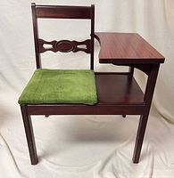 Front angled view showing bench, table, cushion