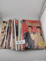 Stack of 11 Maverick Dell comic books in protective sleeves, front issue displayed