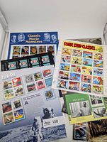 Assorted unused stamp sheets including USA Classic Movie Monsters, Peanuts, Comic Strip Classics, Celebrate the Century 1960s, Canada Nelson Mandela and UK Star Wars
