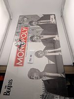 Front view of sealed Beatles Monopoly box