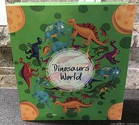 Front of sealed Dinosaurs World advent calendar box