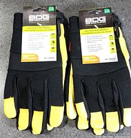 Two pairs of BDG Goatskin Performance gloves with tags