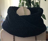 Scarf looped on mannequin showing overall look