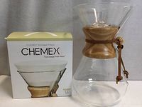 Chemex 3-cup coffee maker beside filter box
