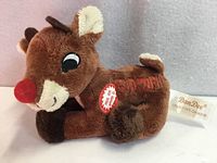 Full view of Dan Dee Rudolph musical plush showing overall appearance and red nose