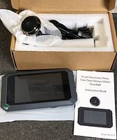 Full contents in box: monitor, camera module, cable, booklet