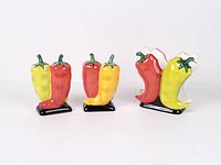 Front view of napkin holder and two shakers