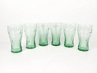 All six green Coca-Cola tumblers front view