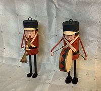 Front view of both tin soldier ornaments