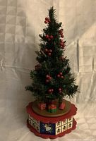 Full view of tree on rotating drawer base