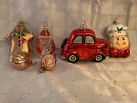 Group shot of six glass ornaments