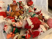 Top view of tray filled with assorted flocked Christmas figurines