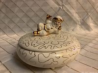 Top view showing Santa finial and gold pattern