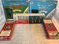 All items: two bubble lamp boxes, candle light set box, four icicle boxes