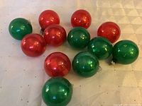group shot of all twelve red and green ornaments
