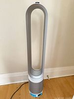 Full view of Dyson tower purifier fan with power cord