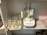 Processor base and storage case with attachments