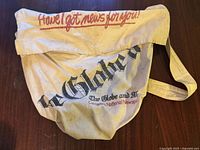 Front view of bag showing The Globe and Mail logo
