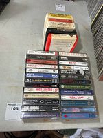 Overall view showing two stacks of 26 cassettes and five eight-track cartridges