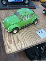 Front-side view of green Tonka VW Beetle toy car