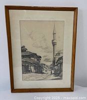 Full view of framed pencil sketch under glass