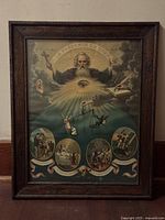 Full view of framed religious print in wood frame