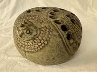 Top and side view of Fitz and Floyd rooster flower frog, showing glaze and perforations