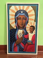 Full view of framed oil painting showing Madonna and child icon