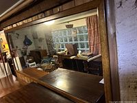 Full view of rectangular mirror mounted on wall