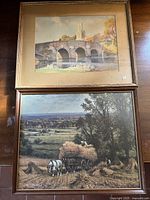 Both framed artworks stacked for overview