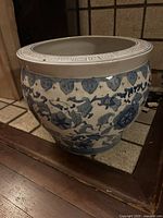 Overall view of porcelain planter showing decoration and shape