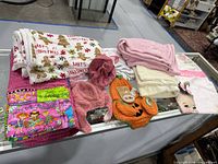 All blankets and accessories displayed on glass case