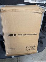 Closed cardboard box printed with Dreo Inflatable Swimming Pool Model DRHSP001