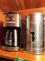 Cuisinart coffee maker and Premier urn side by side on shelf