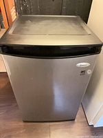 Front view of Whirlpool stainless steel mini refrigerator