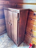 Front view of solid pine cabinet showing two doors