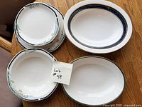 Group shot of all five Royal Doulton pieces