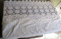 Both runners overlayed showing crochet and linen pieces