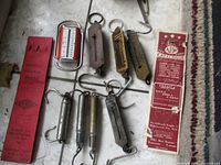 Lot overview of scales, hook packages and catalogue