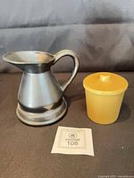 Charcoal Dartmouth jug beside mustard Dragon crock with lid