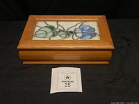 Closed jewelry box top view showing stained glass lid