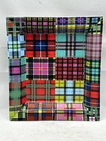 Top view of multicolor tartan porcelain tray
